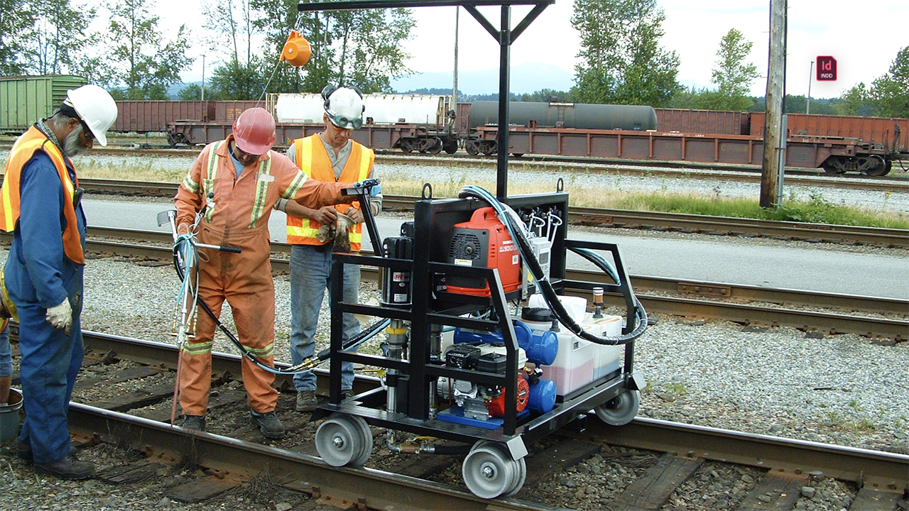 Pictured: Use of SpikeFast® shortly after its 1999 market introduction. (WVCO Railroad Solutions Photograph)