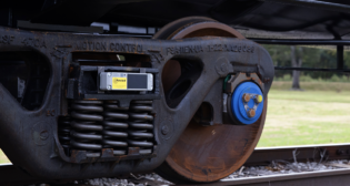 Amsted Digital Solutions IQ Series gateway mounted on a railcar truck. (Amsted Digital Solutions Photograph)