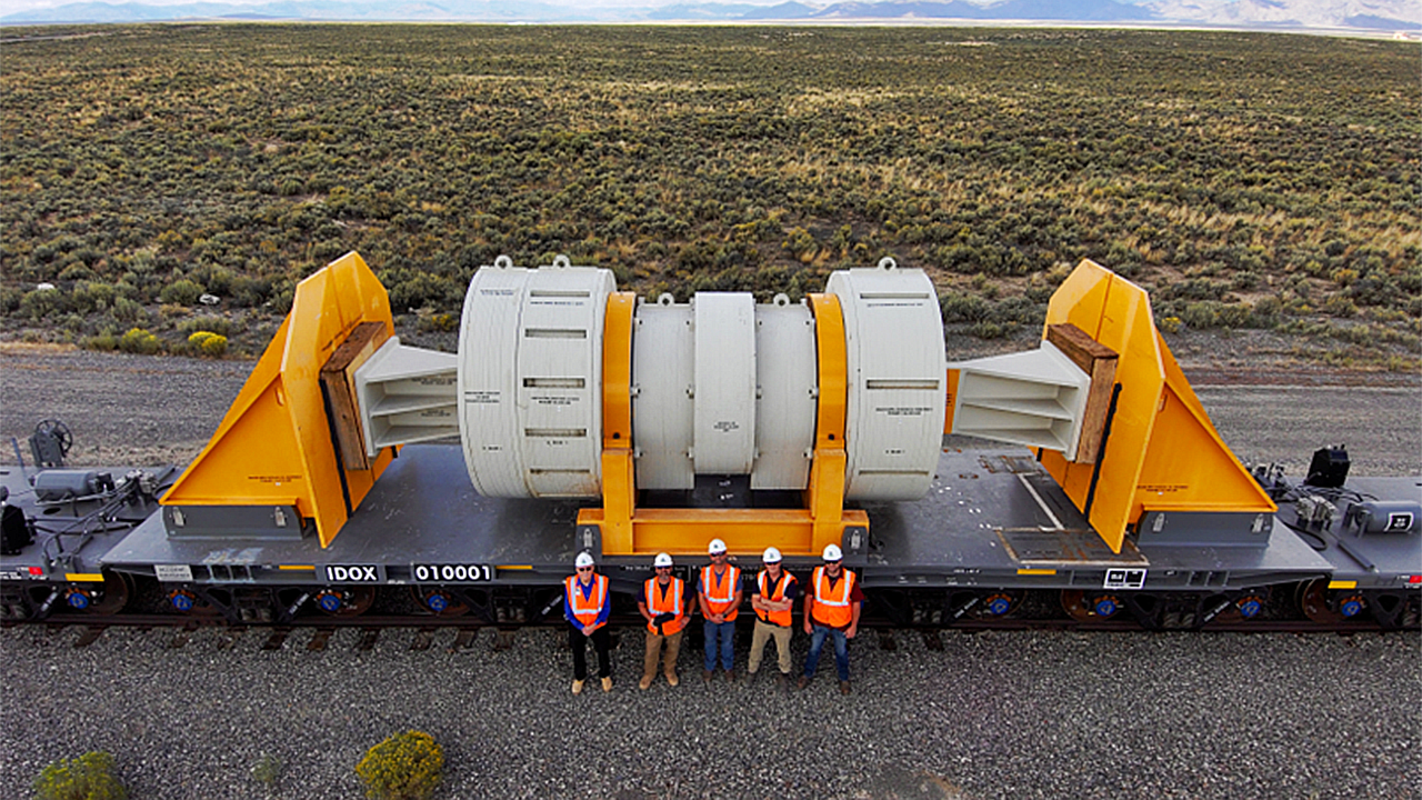 Atlas (pictured) is a 12-axle U.S. Department of Energy-designed railcar for transporting shipments of spent nuclear fuel weighing up to 480,000 pounds (240 tons). The $33 million project took 10 years to complete. (DOE Photograph)