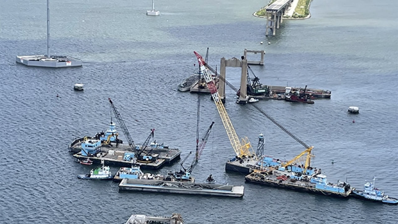 Aerial photos taken Friday afternoon, June 7, 2024 by Maryland State Police Aviation Command shows salvors continue pulling massive, mangled chunks of Francis Scott Key Bridge wreckage from the depths of the Patapsco River.
