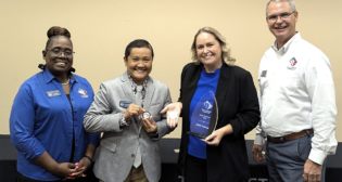 “We’re proud to be recognized by the Texas Veterans Commission [TVC] with its ‘Large Employer of the Year’ award!” BNSF reported Aug. 16 via social media. Pictured, from left to right: TVC District Manager Jo Ikard, TVC Veteran Employee Liaison Jay Zimmerman, BNSF Director of Talent Acquisition Kelly Jimenez and TVC Division Director Charlie Catoe at the TVC awards ceremony Aug. 9 in Humble, Tex. (BNSF Photograph)