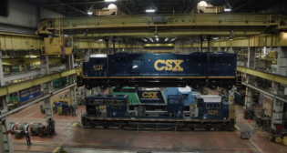 “From the machinists in the wheel shop to the electricians and the clerical employees who ensure we have the necessary materials, this achievement is truly a ONE CSX team effort,” CSX Plant Superintendent Mike Langhauser said of the Huntington Heavy Repair Shop’s recent AAR M-1003 certification with zero exceptions. (Screen Grab from the CSX Video)