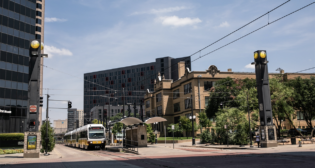 “Proximity to DART adds value to development,” DART President and CEO Nadine Lee said during her State of the Agency address. “The impact of DART light rail investments on local development shows residential and office space rent for substantially higher than surrounding projects.” (DART Photograph)