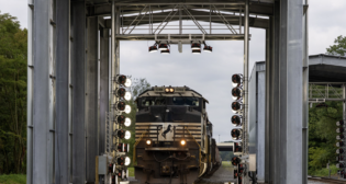 “At Norfolk Southern, we are leveraging cutting-edge AI and enhanced imaging to set new industry standards for safety and operational excellence,” EVP and Chief Information and Digital Officer Anil Bhatt reported via LinkedIn on March 3. “Our Digital Train Inspection portals are a testament to this innovation—combining advanced AI algorithms, developed by our Data Scientists in close collaboration with our Mechanical experts, to analyze railcars at full speed. Each portal captures approximately 1,000 images per passing railcar, generating petabytes of data every month. This vast dataset is processed in real-time by AI models that detect emerging conditions with precision, helping our teams take proactive action.” (Photograph Courtesy of Anil Bhatt)