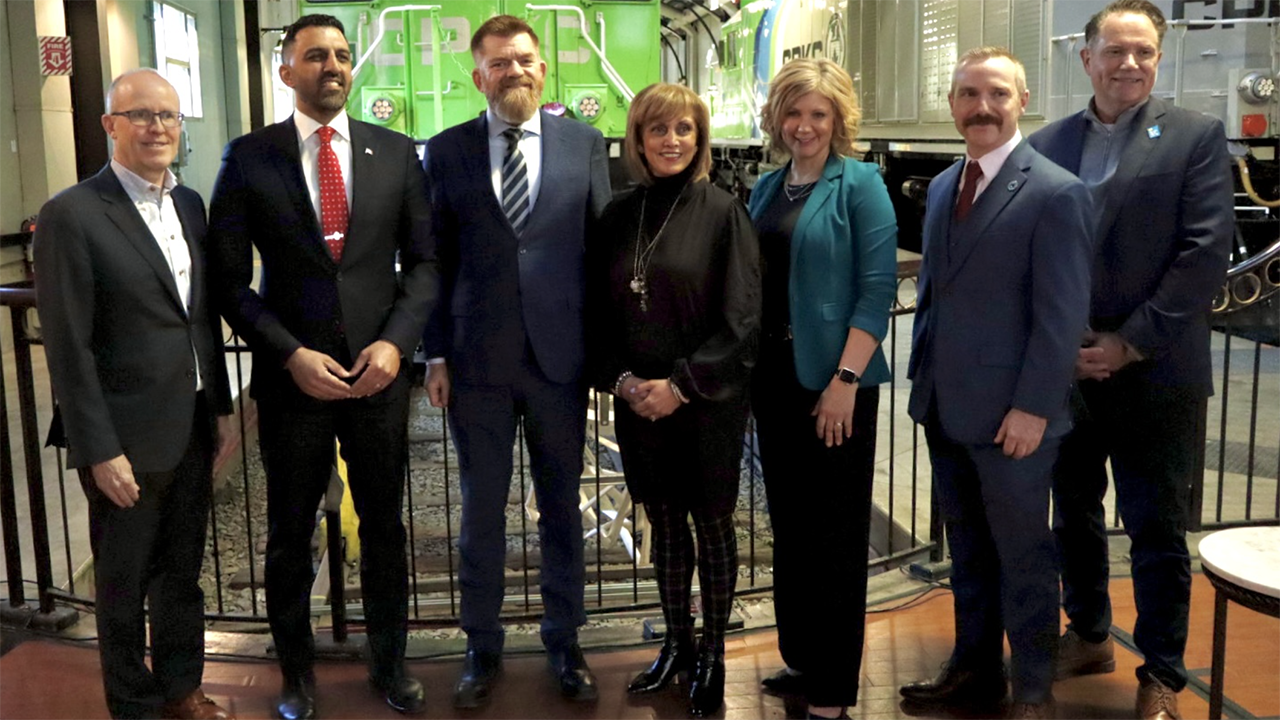 Pictured, left to right at the home of CPKC’s Hydrogen Locomotive Program in Calgary: James Clements, Executive Vice President Strategic Planning & Corporate Services at CPKC; Calgary Skyview MP George Chahal; Energy Minister Brian Jean; Mayor Jyoti Gondek; Reeve Amber Link; Zak Cunningham, Calgary Region Hydrogen Hub Lead at The Transition Accelerator; and Brad Parry, President and CEO of Calgary Economic. (Calgary Economic Development Ltd. Photograph)