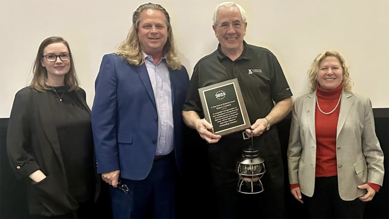 OLI Board Chair and ASLRRA SVP, Safety, Regulatory, and Environmental Policy Jo Strang (far right) pictured with F. Tom Roberts Memorial Volunteer Award honoree Bob Crawford (center). They are joined by Jessica Devorsky, Texas Operation Lifesaver State Coordinator and F. Tom Roberts Award Committee Chair (far left), and Mark Sexton, Oklahoma Operation Lifesaver State Coordinator. (OLI Photograph)