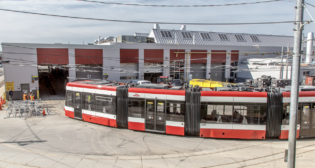 Pictured: TTC’s Harvey Shop Building, part of the Hillcrest Complex in Toronto. The complex will be expanded to house about 25 more Alstom LRVs, part of a new 60-car order. (TTC Photograph)