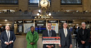 MTA Chair and CEO Janno Lieber (second from right) and Metro-North Railroad President Justin Vonashek (center) were joined by CTDOT Commissioner Garrett Eucalitto (far left) at Grand Central Terminal to announce new schedules due to signal and infrastructure improvements on the New Haven Branch. (Marc A. Hermann / MTA)