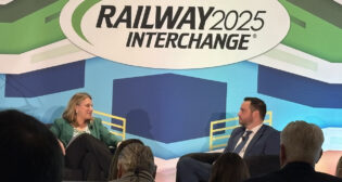 FRA Acting Administrator Drew Feeley (right) sat down for a “fireside chat” with Emily Kimball, Partner-Global Regulatory for Hogan Lovells, at Railway Interchange 2025. (Marybeth Luczak Photograph)