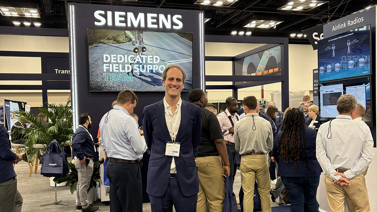 Alvaro Senador-Gomez (center) is Siemens Mobility’s new President of Rail Infrastructure in North America. He joins his team at Railway Interchange in Indianapolis to showcase the company’s latest technology. (Photograph by Marybeth Luczak)