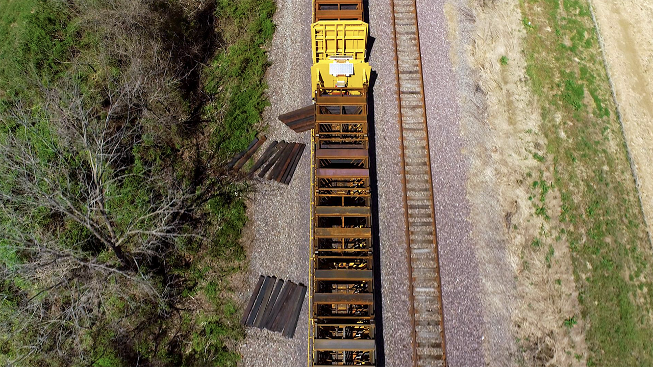 UP’s automated cross tie unloading equipment in action in North Little Rock, Ark. (UP Photograph)