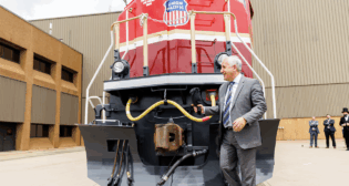 Union Pacific CEO Jim Vena christened No. 1616 at the unveiling ceremony at Jenks Locomotive Shop in North Little Rock, Ark., which was attended by Arkansas Lt. Gov. Leslie Rutledge, North Little Rock Mayor Terry Hartwick, and Lincoln Presidential Foundation Chairman Emeritus Sergio “Satch” Pecori, as well as UP executives and railroaders. (UP Photograph)