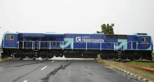 The new ES43ACi features blue and turquoise-colored livery of La Compagnie de TransGuinéen, the joint venture company that will operate the Simandou Railway. (Wabtec Photograph)