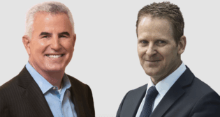 Marty Neese, incoming President and CEO (left), and Randall MacEwen, outgoing President and CEO, at Ballard. (Ballard Photographs)