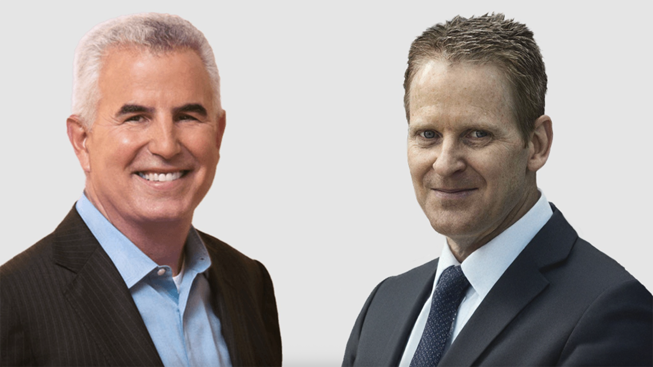 Marty Neese, incoming President and CEO (left), and Randall MacEwen, outgoing President and CEO, at Ballard. (Ballard Photographs)