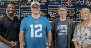 CSX dispatchers Vic Lewis and Rick Moran earn the railroad’s first Public Safety Coordination Center awards for their service. (CSX Photograph)