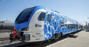 “The new ZEMU is easy to spot with its signature blue and white water-vapor design wrapped around the train’s two passenger cars and center power pack where the hydrogen and battery propulsion system is located,” according to SBCTA. (Photograph Courtesy of SBCTA)