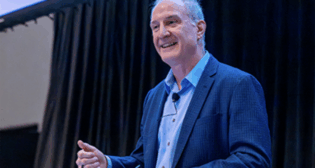 Eric Gebhardt, CTO of Wabtec, gave the keynote speech on day one of the Third Annual TTC Conference & Tour. (Caption and Photograph Courtesy of ENSCO)