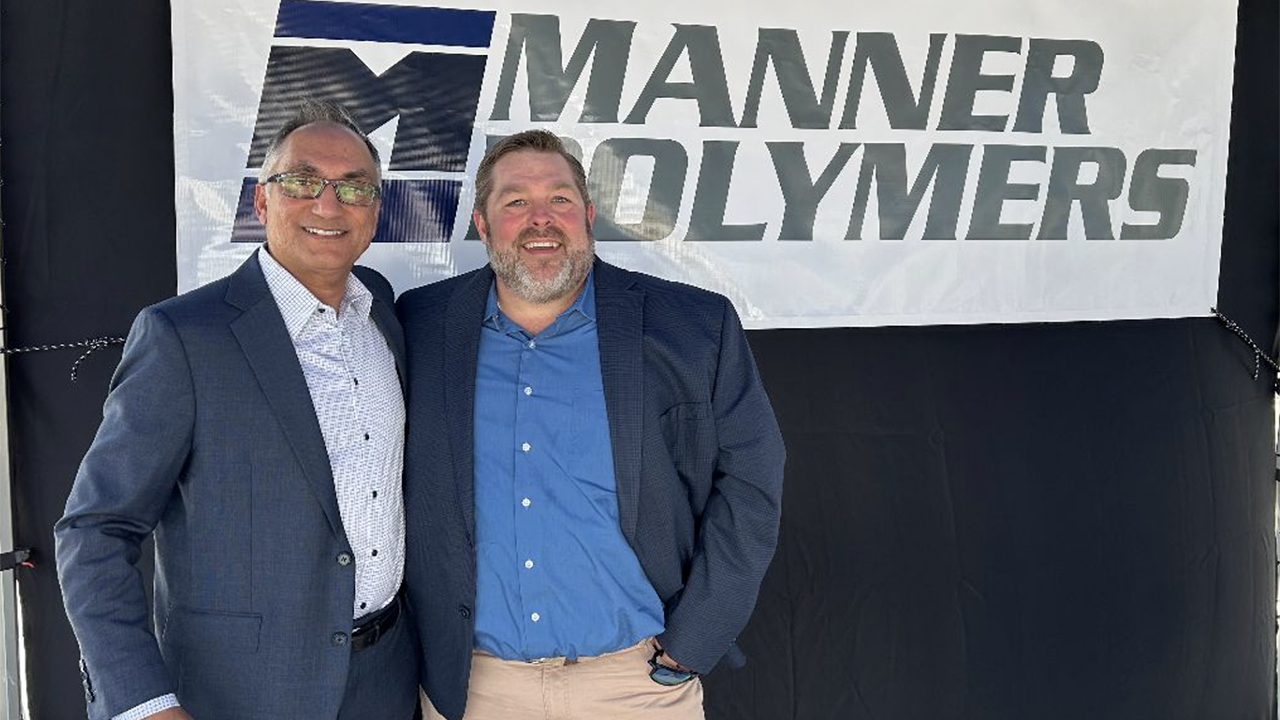 Union Pacific’s Ryan Wee, Manager-Industrial Development (right), with Manner Polymers President and CEO Raj Bhargava. (Photograph Courtesy of UP)