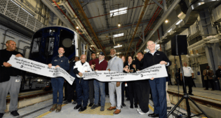 MTA Chair and CEO Janno Lieber, MTA New York City Transit President Demetrius Crichlow, MTA Construction & Development President Jamie Torres-Springer, and other officials cut the ribbon on the new Railcar Acceptance and Testing Facility in Sunset Park on Nov. 21. (Marc A. Hermann / MTA)