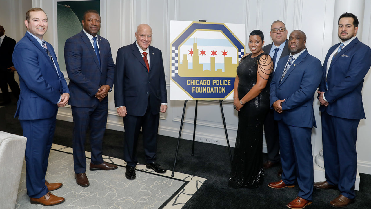 During the True Blue gala on Nov. 14, Herbert Smith (left), NS Regional Vice President of Government Relations, awarded a grant to the Chicago Police Foundation. Standing next to Smith are CPD Superintendent Larry Snelling and Chicago Police Foundation Chairman Rick Simon. (Caption and Photograph Courtesy of NS)