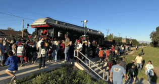 SNR’s Ventura Division and Operation Toy Train brought holiday joy to the Santa Clara River Valley—by rail between Ventura and Santa Paula and by truck from Fillmore to Piru. (Courtesy of SNR)