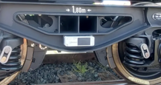 The Amsted Digital Solutions Inc. IQ device mounted on a freight car truck. (Courtesy of GBXLE and Amsted Digital)