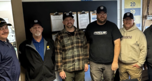 The Smoky Ridge Railroad team on the first day of operations (from left to right): Randy Burington, Tony Clark, Tim Keegan, Chris Lewis, Thomas “Jesse” Resch, and Tim Lewis. (Courtesy of Watco)