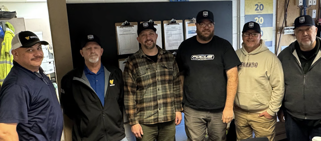 The Smoky Ridge Railroad team on the first day of operations (from left to right): Randy Burington, Tony Clark, Tim Keegan, Chris Lewis, Thomas “Jesse” Resch, and Tim Lewis. (Courtesy of Watco)